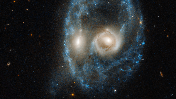 Фотография столкновения двух галактик, сделанная телескопом Хаббл - 俄罗斯卫星通讯社