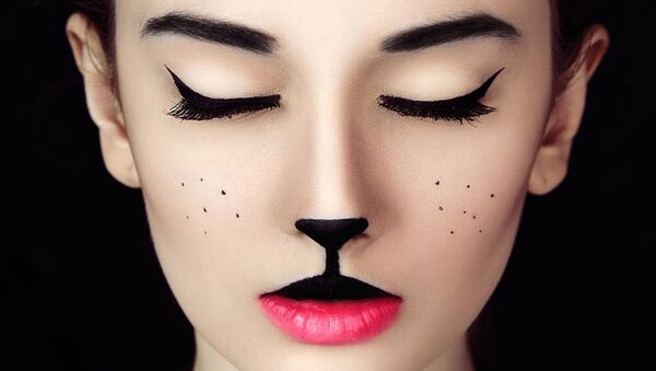 Женщина-кошка Женщина-кошка - 俄羅斯衛星通訊社