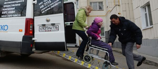 Пассажиры бесплатного такси для детей с ограниченными возможностями Пассажиры бесплатного такси для детей с ограниченными возможностями - 俄罗斯卫星通讯社