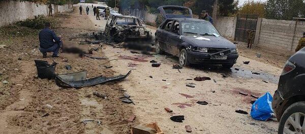 Сотрудники правоохранительных органов на месте нападения вооруженной группы на погранзаставу Ишкобод в Таджикистане - 俄罗斯卫星通讯社