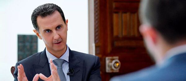 Президент Сирии Башар Асад во время интервью - 俄罗斯卫星通讯社
