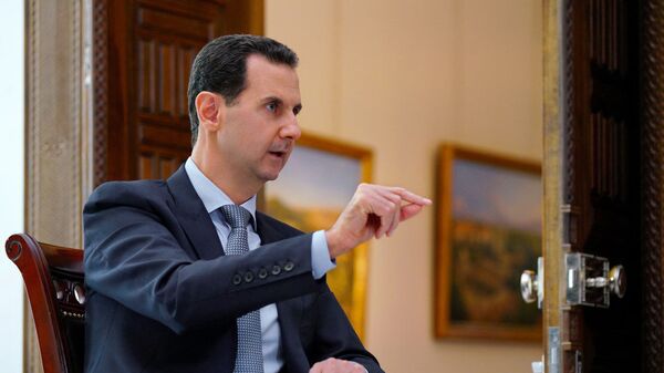 Президент Сирии Башар Асад во время интервью  - 俄羅斯衛星通訊社
