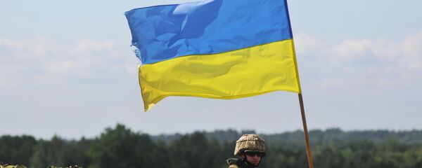 Украинский военный на международных командно-штабных учениях Rapid Trident 2016 на Яворовском полигоне во Львовской области Украинский военный на международных командно-штабных учениях Rapid Trident 2016 на Яворовском полигоне во Львовской области - 俄罗斯卫星通讯社