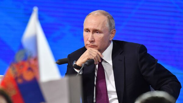 Президент РФ Владимир Путин во время ежегодной большой пресс-конференции  - 俄罗斯卫星通讯社