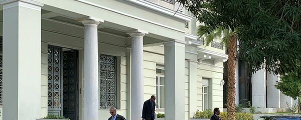 Ливийский посол Мохаммед Юнис Менфи покидает здание МИД Греции - 俄罗斯卫星通讯社