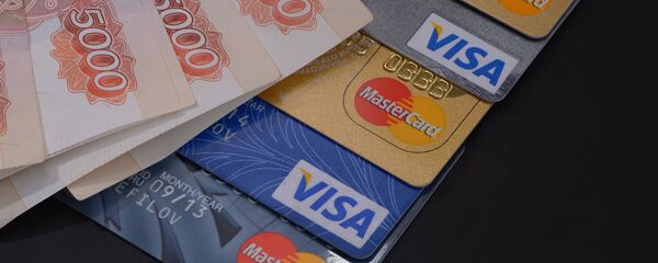 Денежные купюры России и банковские карты - 俄罗斯卫星通讯社