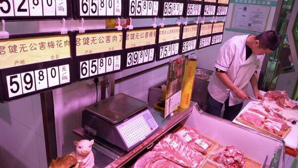 Продавец в мясном магазине в Китае - 俄羅斯衛星通訊社