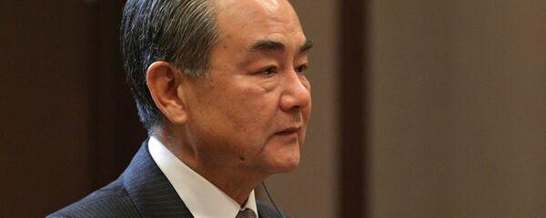 Министр иностранных дел Китая Ван И во время встречи с президентом России Владимиром Путиным в Сочи - 俄羅斯衛星通訊社