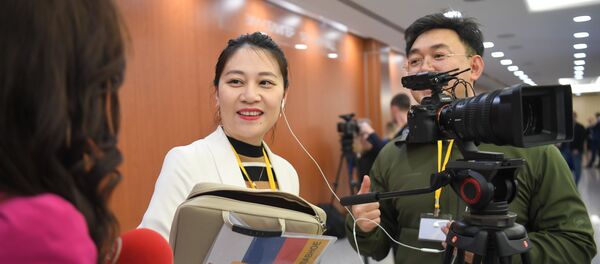 中国媒体记者 - 俄罗斯卫星通讯社