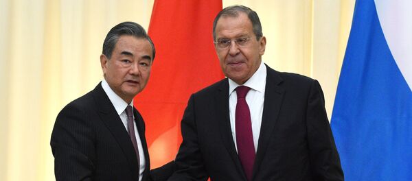 Министр иностранных дел РФ Сергей Лавров и министр иностранных дел КНР Ван И. Министр иностранных дел РФ Сергей Лавров и министр иностранных дел КНР Ван И. - 俄罗斯卫星通讯社