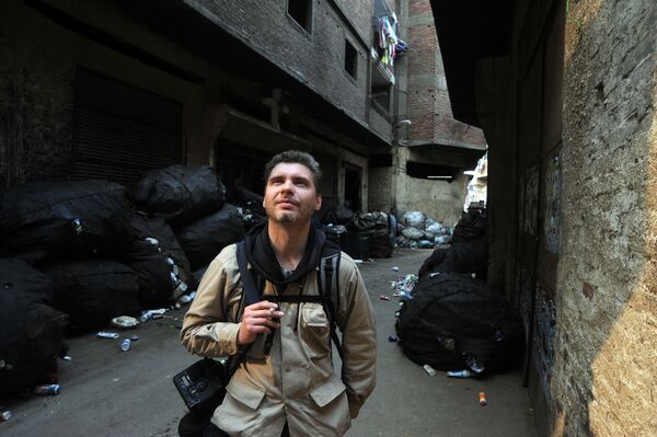 Фотокорреспондент Андрей Стенин на улице Каира - 俄罗斯卫星通讯社