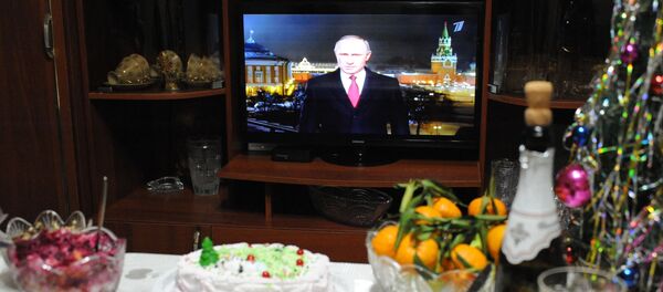 Праздничный стол во время встречи Нового года в Чите - 俄羅斯衛星通訊社