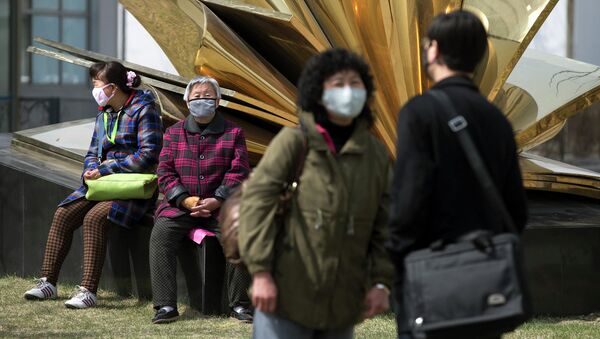 Жители Пекина в медицинских масках - 俄罗斯卫星通讯社