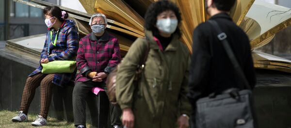 Жители Пекина в медицинских масках Жители Пекина в медицинских масках - 俄羅斯衛星通訊社