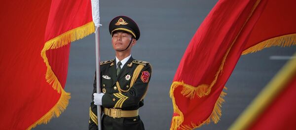 A Chinese honour guard holds a flag ahead of a welcome ceremony for Niger President Mahamadou Issoufou (not pictured) at the Great Hall of the People in Beijing on May 28, 2019. A Chinese honour guard holds a flag ahead of a welcome ceremony for Niger President Mahamadou Issoufou (not pictured) at the Great Hall of the People in Beijing on May 28, 2019. - 俄罗斯卫星通讯社