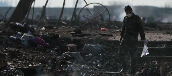 На месте крушения пассажирского лайнера Украины Boeing 737-800 На месте крушения пассажирского лайнера Украины Boeing 737-800 - 俄罗斯卫星通讯社