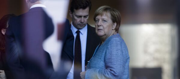 Представитель кабмина ФРГ Штеффен Зайберт и канцлер Германии Ангела Меркель Представитель кабмина ФРГ Штеффен Зайберт и канцлер Германии Ангела Меркель - 俄罗斯卫星通讯社