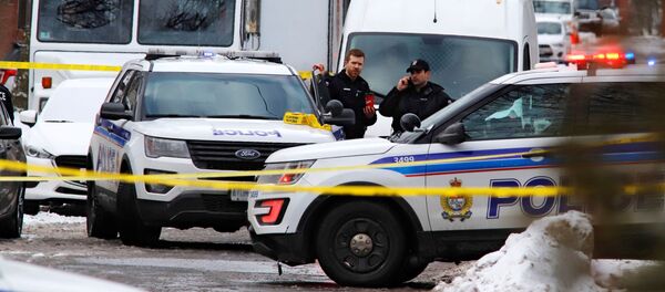 Сотрудники канадской полиции на месте стрельбы в Оттаве - 俄羅斯衛星通訊社