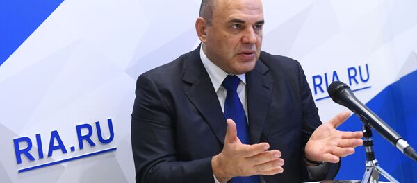 Руководитель Федеральной налоговой службы РФ Михаил Мишустин на IV Восточном экономическом форуме во Владивостоке - 俄羅斯衛星通訊社