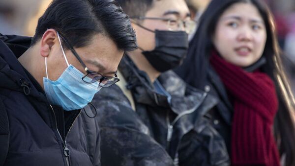 Китайцы в медицинских масках - 俄羅斯衛星通訊社