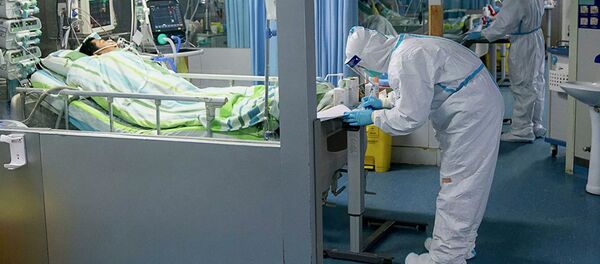 Врачи в отделении интенсивной терапии больницы Чжуннань в Ухане в провинции Хубэй в центральном Китае - 俄罗斯卫星通讯社