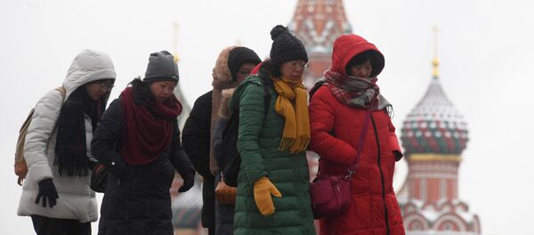 Иностранные туристы на Красной площади в Москве - 俄罗斯卫星通讯社