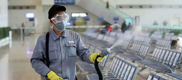 Дезинфекция зала ожидания на вокзале в Нанкине, КНР. 27 января 2020 - 俄羅斯衛星通訊社