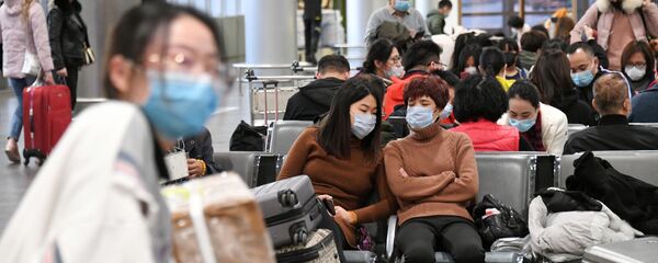 Пассажиры в терминале F аэропорта Шереметьево.  - 俄羅斯衛星通訊社