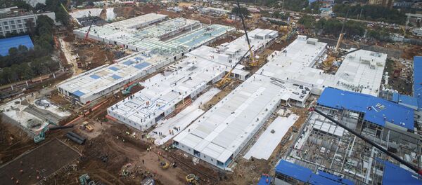 Строительство больницы Хошэньшань для размещения зараженных новым коронавирусом пациентов в городе Ухань - 俄罗斯卫星通讯社