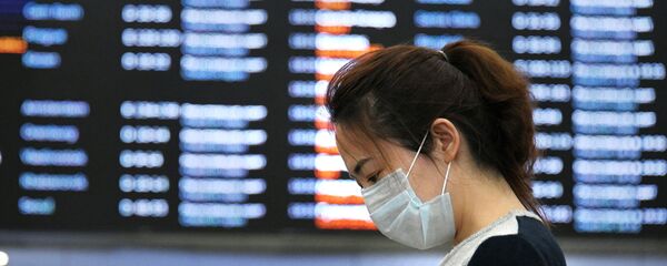 Девушка в терминале F аэропорта Шереметьево.  - 俄罗斯卫星通讯社