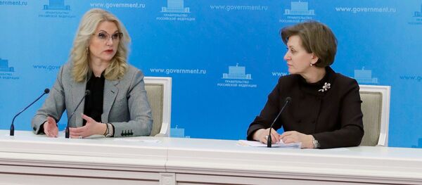 Заместитель председателя правительства РФ Татьяна Голикова и руководитель Федеральной службы по надзору в сфере защиты прав потребителей и благополучия человека (Роспотребнадзор) Анна Попова - 俄羅斯衛星通訊社