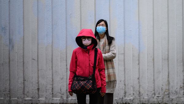 Жители Гонконга в масках - 俄罗斯卫星通讯社