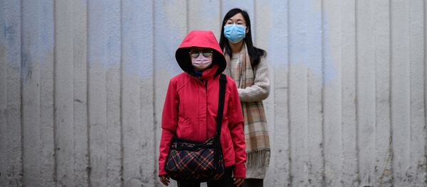 Жители Гонконга в масках - 俄羅斯衛星通訊社