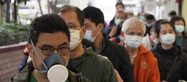 People queue up to buy face masks in Hong Kong People queue up to buy face masks in Hong Kong - 俄罗斯卫星通讯社