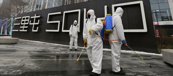 Дезинфекция улицы в Пекине Дезинфекция улицы в Пекине - 俄罗斯卫星通讯社