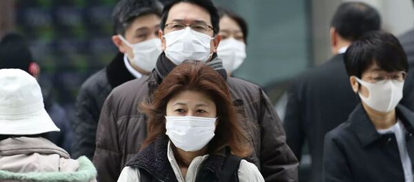 17 февраля 2020. Прохожие в защитных масках в Токио. Япония - 俄羅斯衛星通訊社