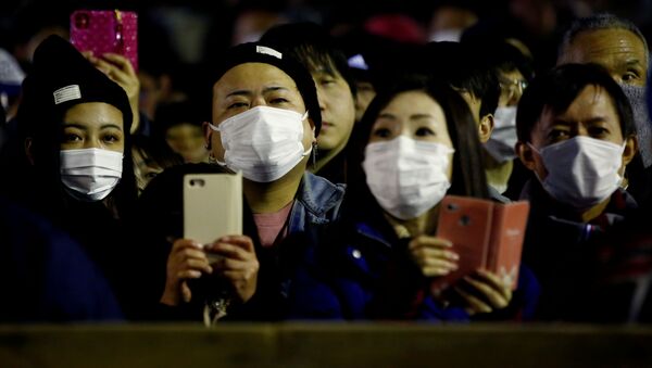 Зрители в защитных масках на Празднике обнаженных мужчин в Японии - 俄羅斯衛星通訊社