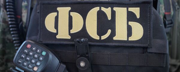 Бронежилет и рация сотрудника ФСБ РФ - 俄罗斯卫星通讯社