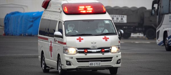 Водители  скорой помощи в защитных медицинских масках в Японии - 俄羅斯衛星通訊社