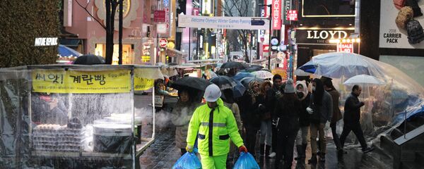 На одной из улиц в центре Сеула. - 俄罗斯卫星通讯社