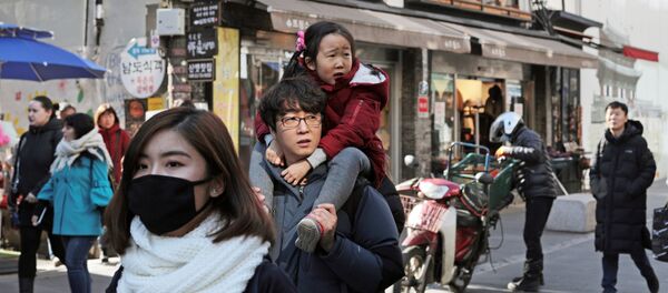 Прохожие на улице Инсандонг в Сеуле. - 俄羅斯衛星通訊社
