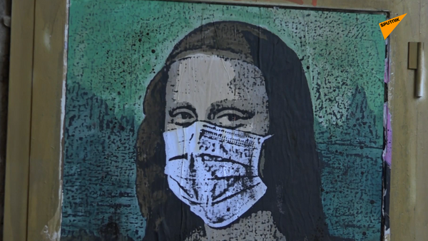 Фреска Моны Лизы со смартфоном и в маске появилась на улице Барселоны - 俄罗斯卫星通讯社