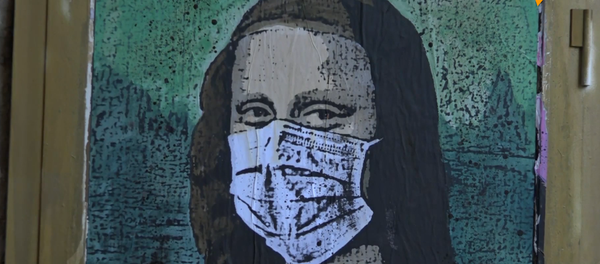 Фреска Моны Лизы со смартфоном и в маске появилась на улице Барселоны - 俄羅斯衛星通訊社