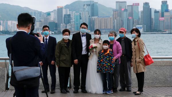 Свадебное фото в медицинских масках в Гонконге - 俄罗斯卫星通讯社