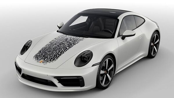Отпечаток пальца владельца на багажнике Porsche 911  - 俄羅斯衛星通訊社