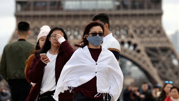 Туристы в масках во Франции - 俄罗斯卫星通讯社