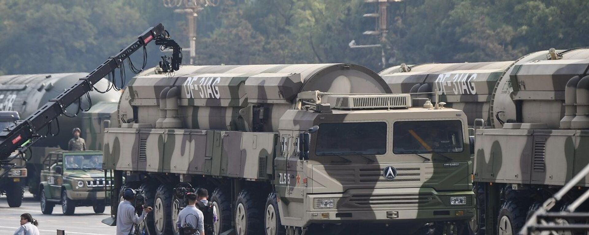 Military vehicles carrying DF-31AG intercontinental ballistic missiles participate in a military parade at Tiananmen Square in Beijing on October 1, 2019, to mark the 70th anniversary of the founding of the People’s Republic of China. - 俄羅斯衛星通訊社, 1920, 06.11.2021