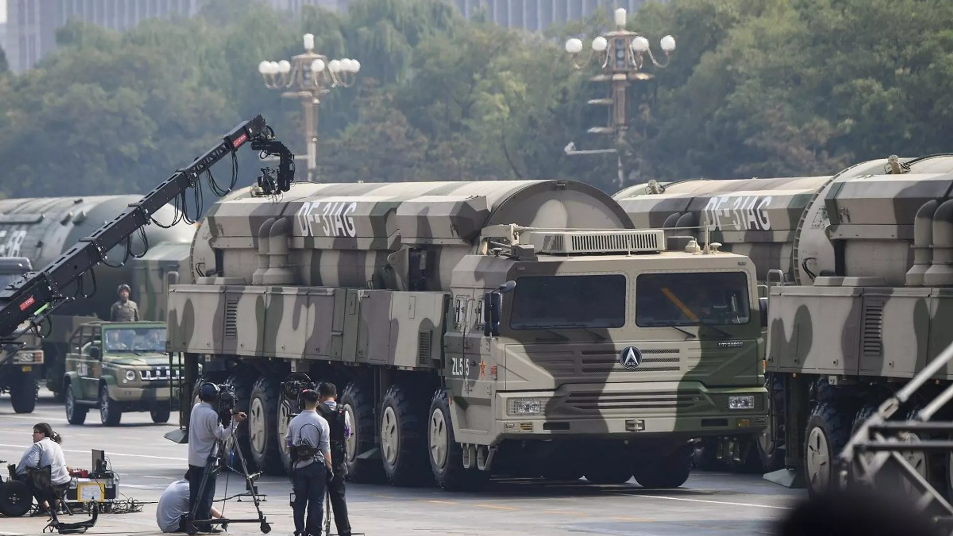 Military vehicles carrying DF-31AG intercontinental ballistic missiles participate in a military parade at Tiananmen Square in Beijing on October 1, 2019, to mark the 70th anniversary of the founding of the People’s Republic of China. - 俄罗斯卫星通讯社, 1920, 06.11.2021