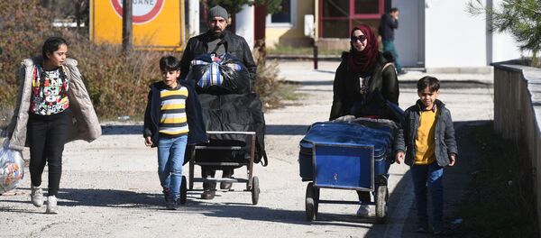 Сирийские беженцы на турецко-сирийской границе в пункте пропуска города Кассаб - 俄罗斯卫星通讯社