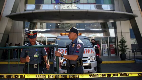 Полиция на месте захвата заложников в торговом центре Вирра на Филиппинах - 俄羅斯衛星通訊社